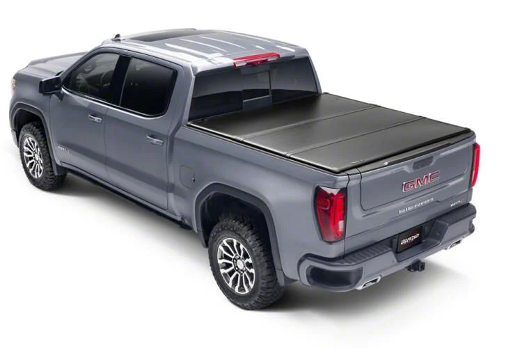 UnderCover Triad Hard Folding Tonneau Cover (03-26 RAM 2500 w/ 6.4-Foot Box & w/o RAM Box)